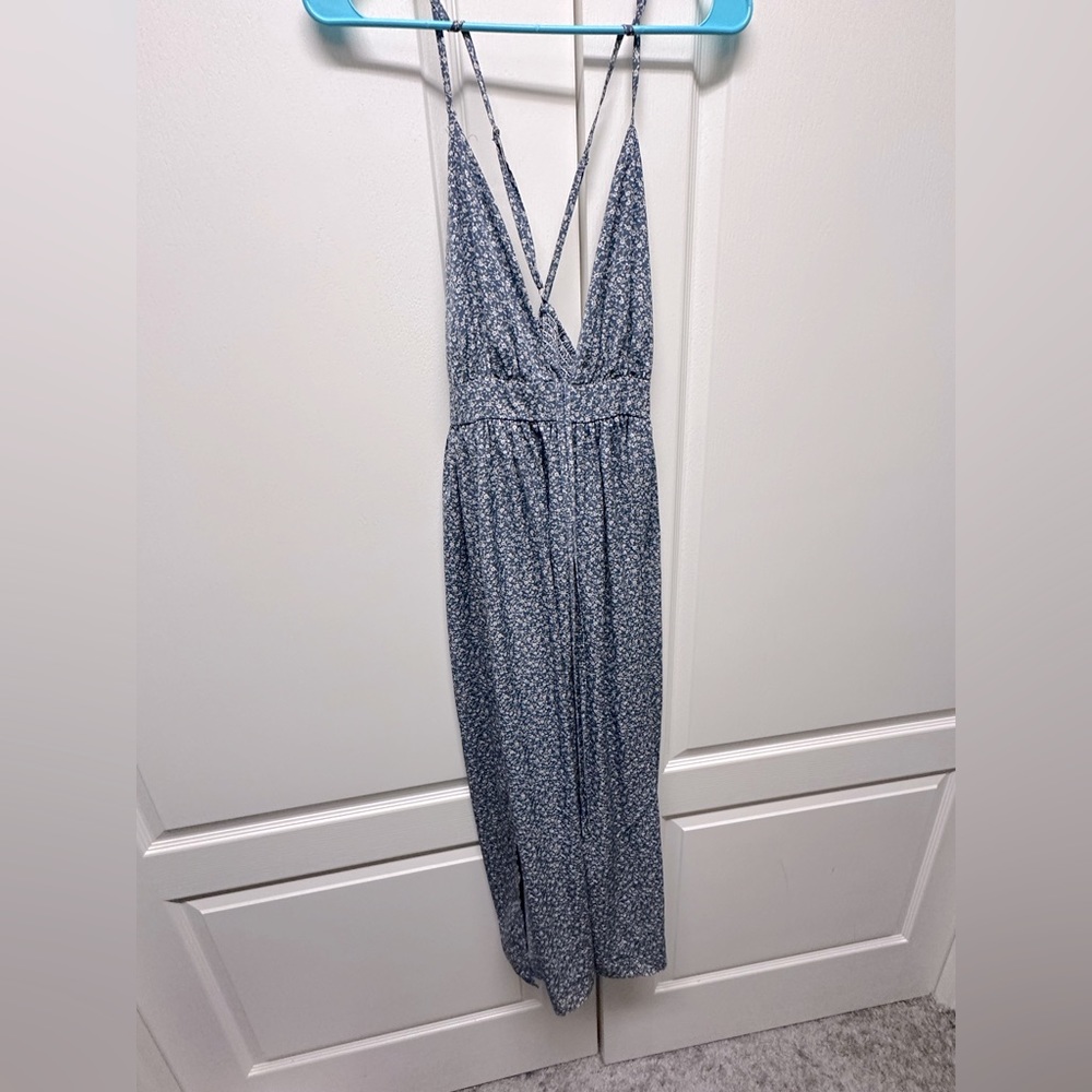 Beautiful floral blue maxi dress with 2 slits on the sides.
